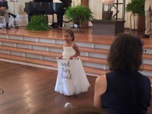 One of the two identical twin flower girls during the recessional